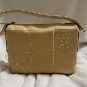 Chanel Ivory Embroidered Logo Chocolate Bar Mini Bag includes dust bag